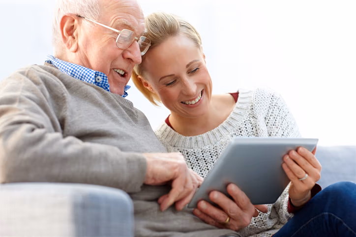 Senior using a personal device on Wi-Fi