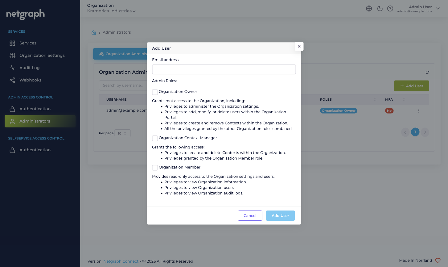 Update User dialog with the three Organization-scope role checkboxes and their bulleted permission descriptions